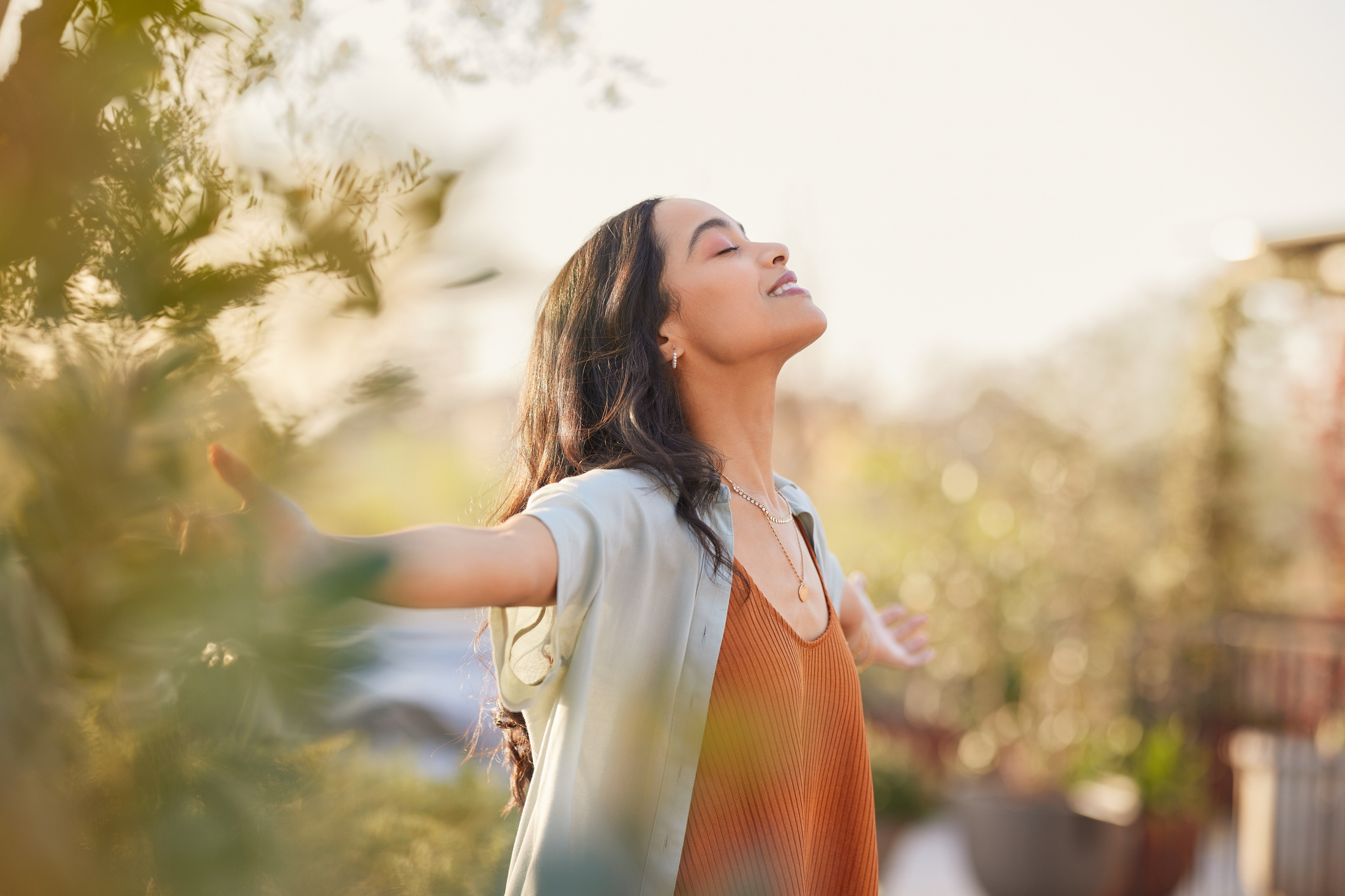Serene latin woman enjoy sunset with gratitude Serene latin woman enjoy sunset with gratitude