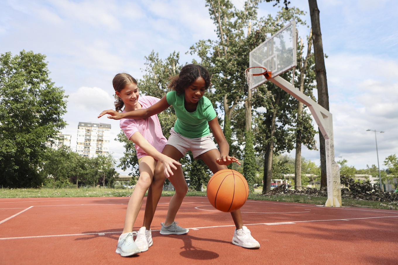 Girls playing basketball Girls playing basketball