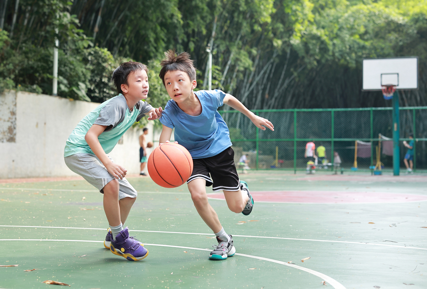 Boys playing basketball Boys playing basketball
