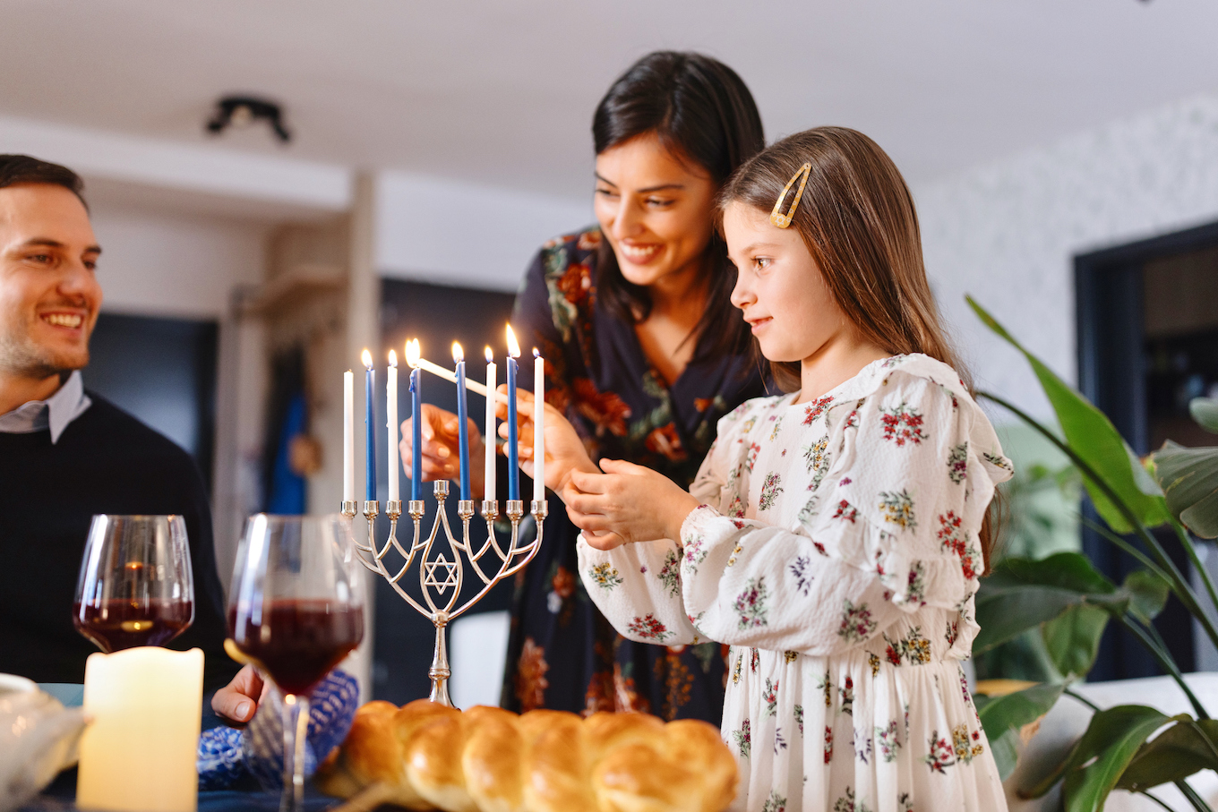 Family celebrating Hanukkah Family celebrating Hanukkah