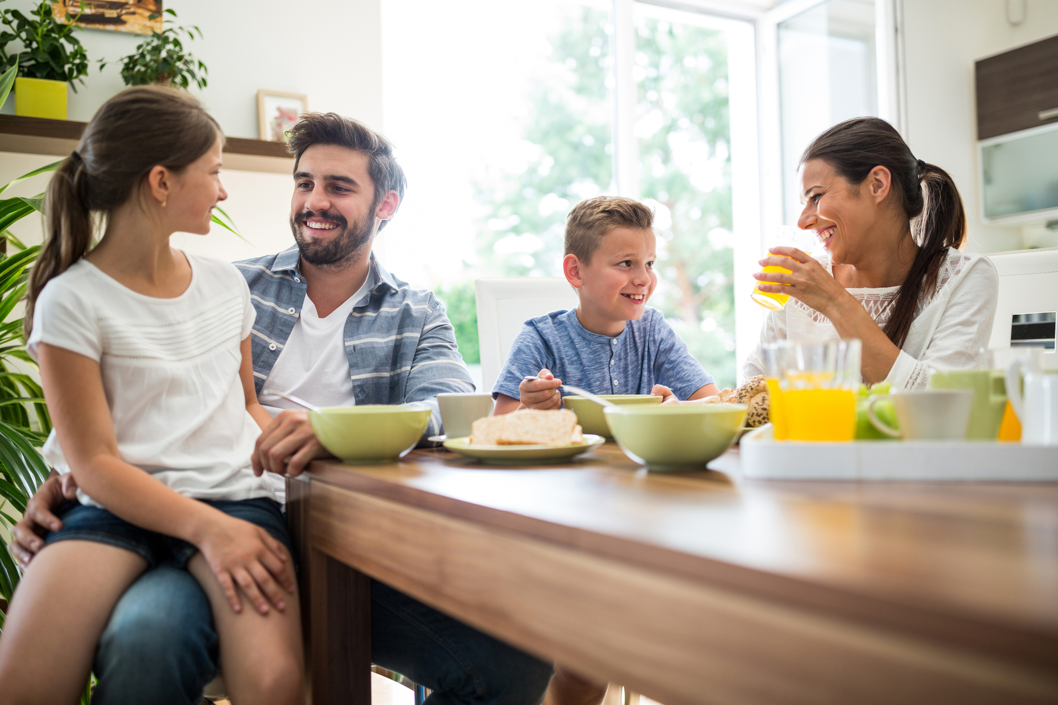 Happy family having breakfast Happy family having breakfast