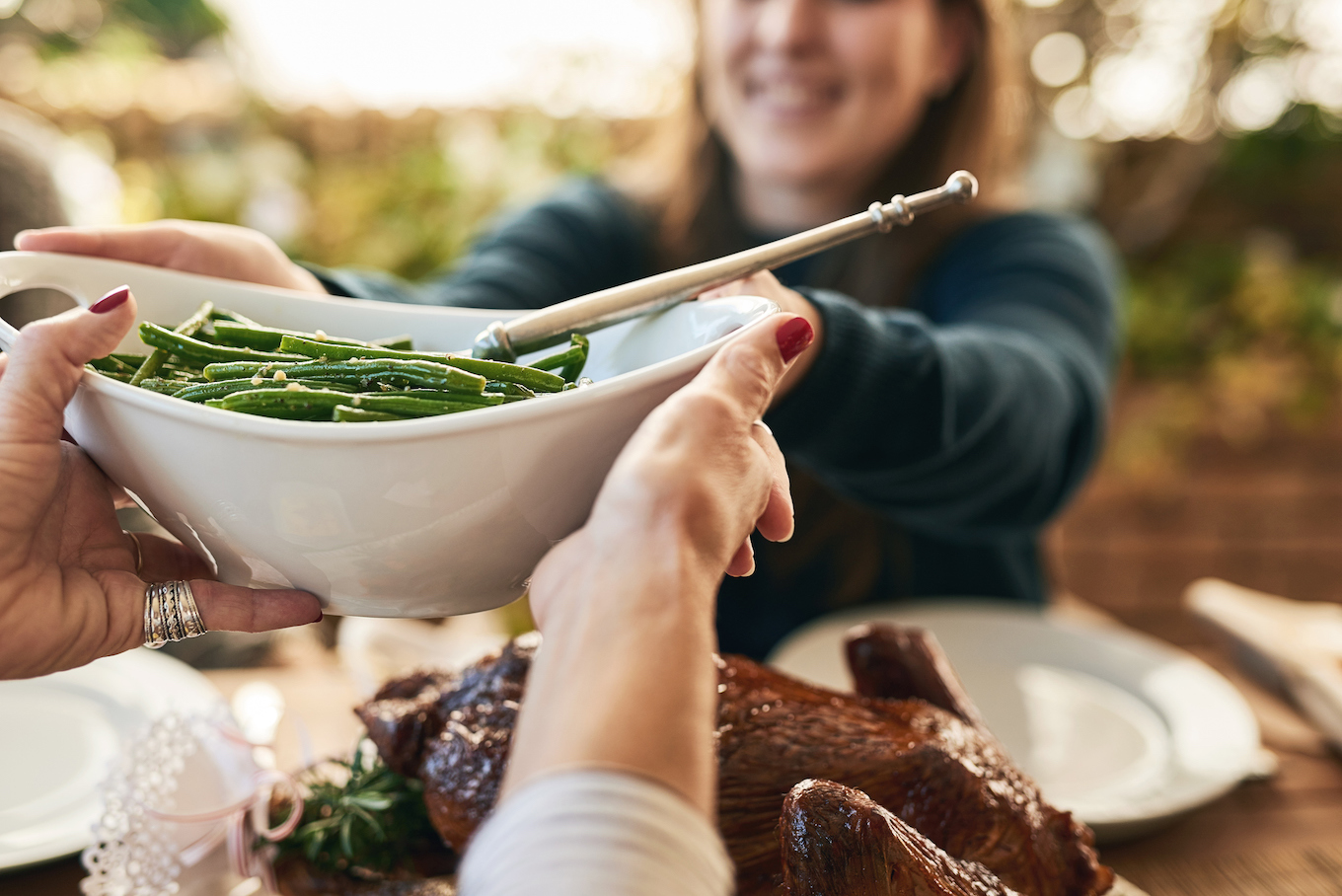 Passing a bowl of green beans Passing a bowl of green beans